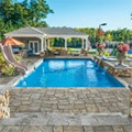 Creative Ways To Incorporate A Waterfall Into Patio And Poolside Hardscapes